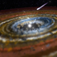 Artist’s impression of exoplanets and comets orbiting Beta Poctoris